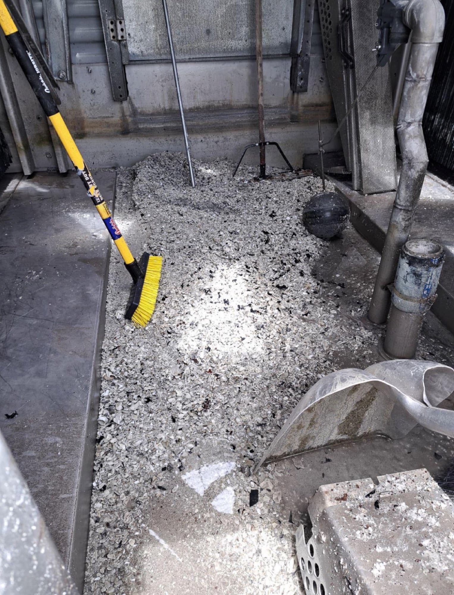 Cooling tower basin cleaned out and rebuilt