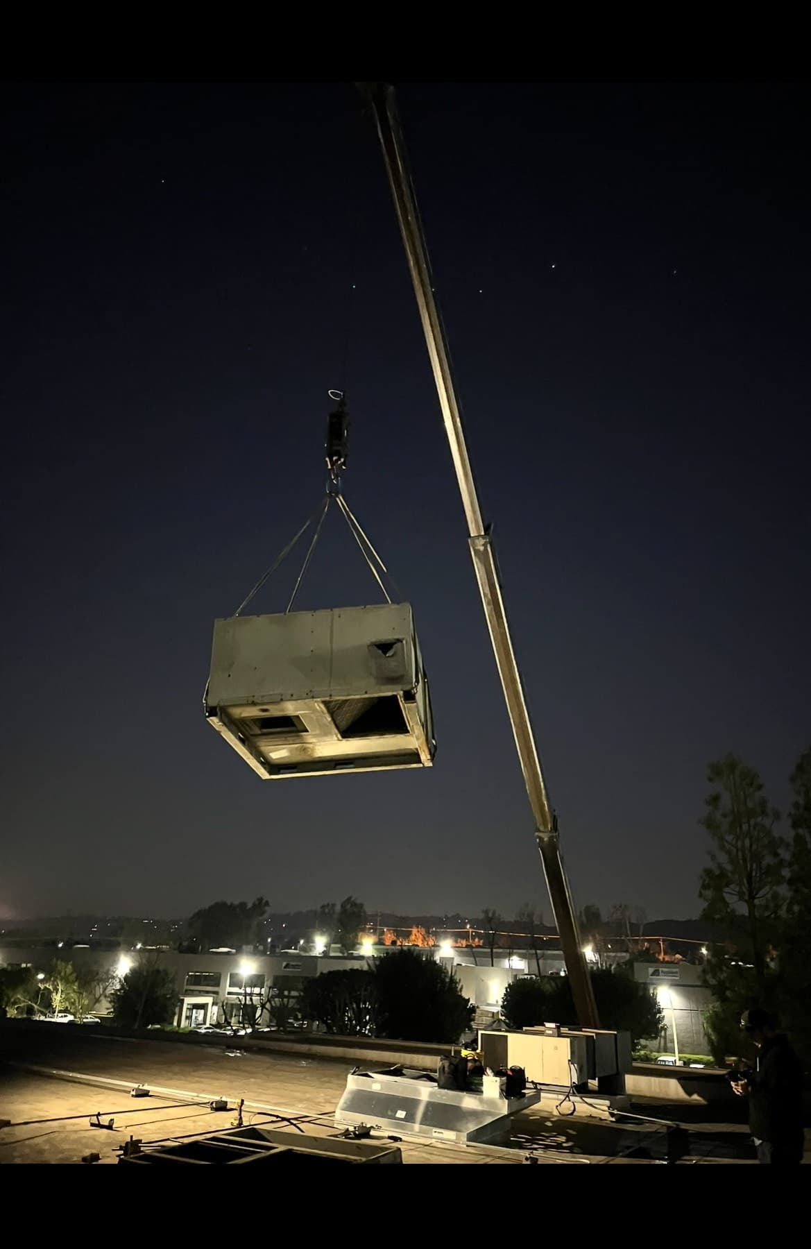 After-hours equipment set under crane lights
